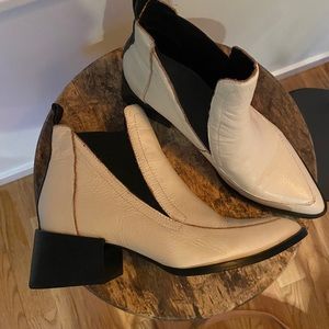 White leather ankle boots